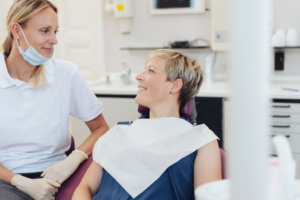 a patient chatting with their orthodontist